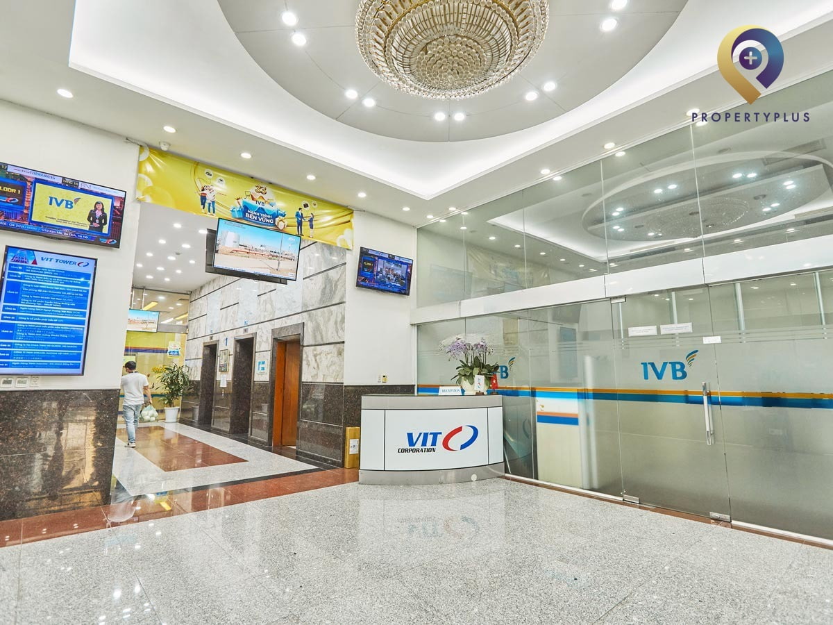 Reception desk at VIT-Tower with clear signage and modern design